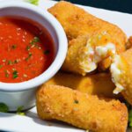 Crispy Baked Mozzarella Sticks with Zesty Marinara Dip