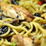 Hearty Tortellini Casserole with Spinach and Mushrooms Delight