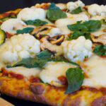 Deliciously Light: Cauliflower Crust Pizza with Mozzarella & Basil