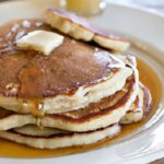 Fluffy Almond Flour Pancakes Drizzled with Maple Syrup Delight