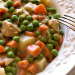 Hearty Chicken Casserole with Carrots and Peas Delight
